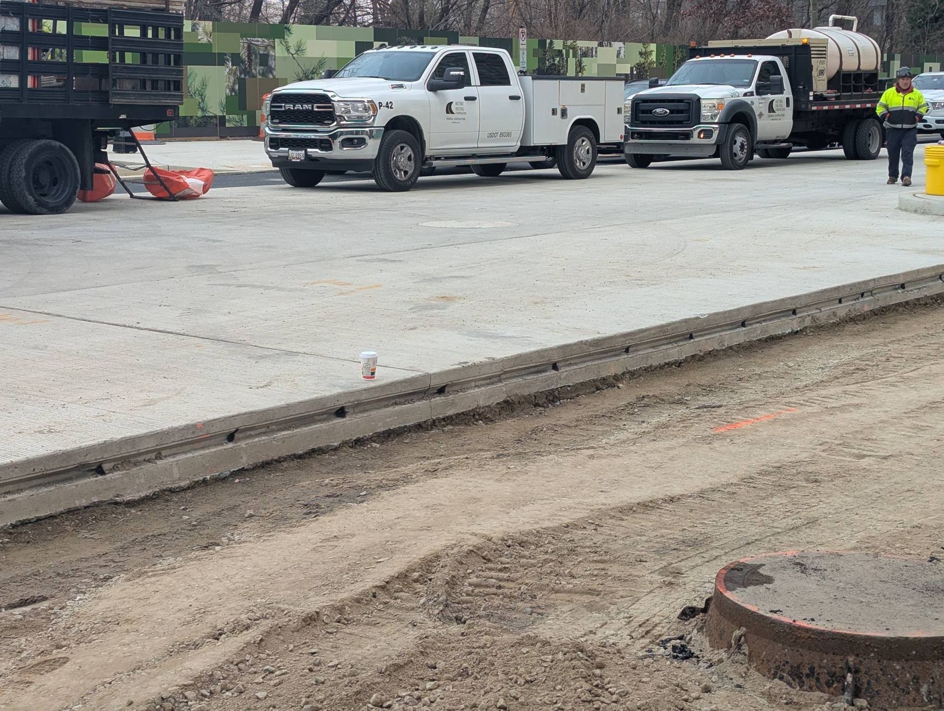 A freshly poured concrete driveway in a suburban Fairfax County neighborhood.