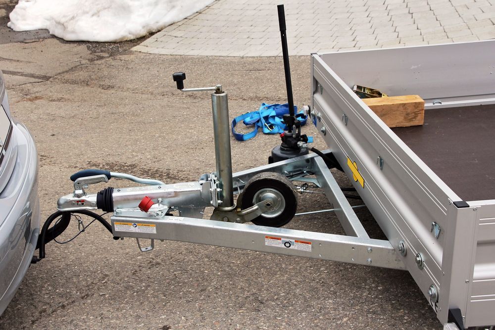 Silver Trailer Attached to a Car — Mid Coast Smash Repairs In Forster, NSW