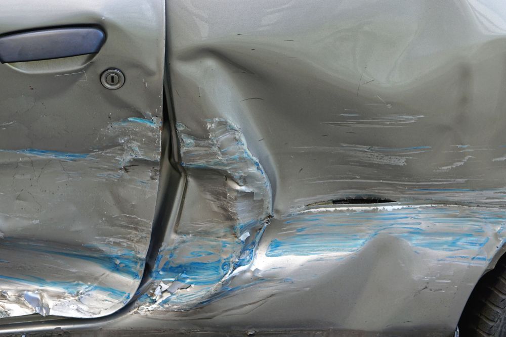 Damaged Gray Car Door — Mid Coast Smash Repairs In Forster, NSW