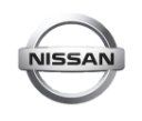 Nissan logo: silver emblem with the word