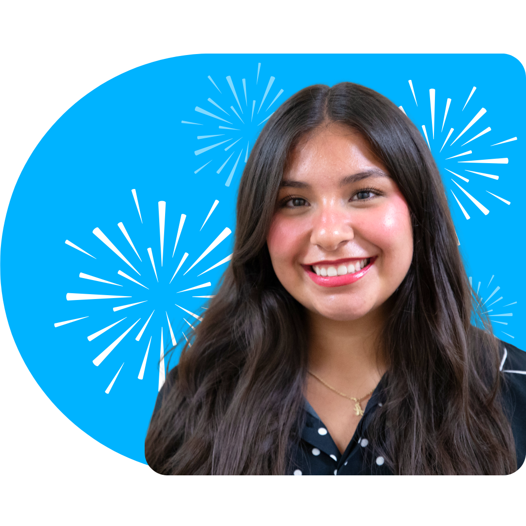 A person smiling, wearing a white blazer against a bright blue background featuring white, stylized firework illustrations.