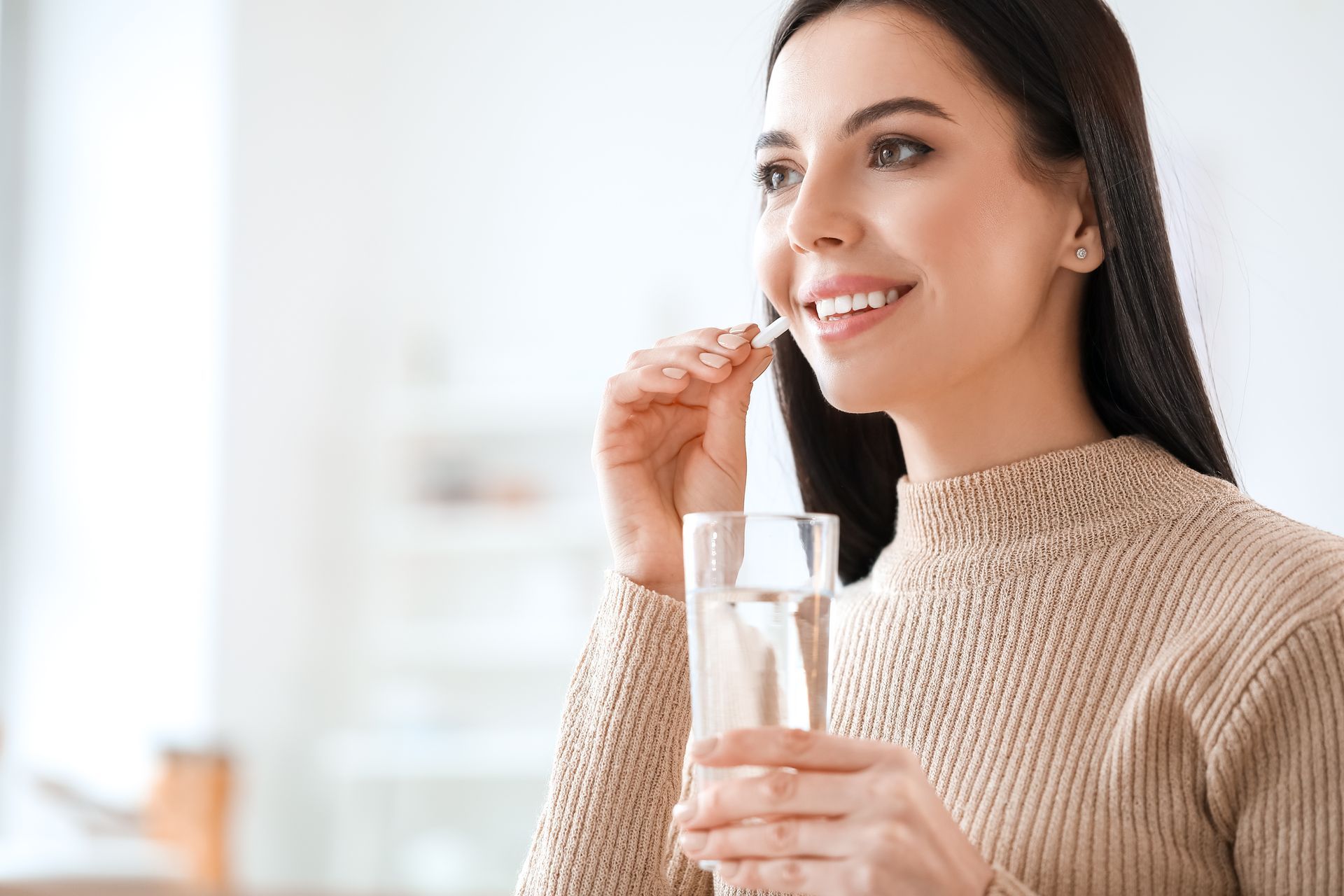 woman taking medication