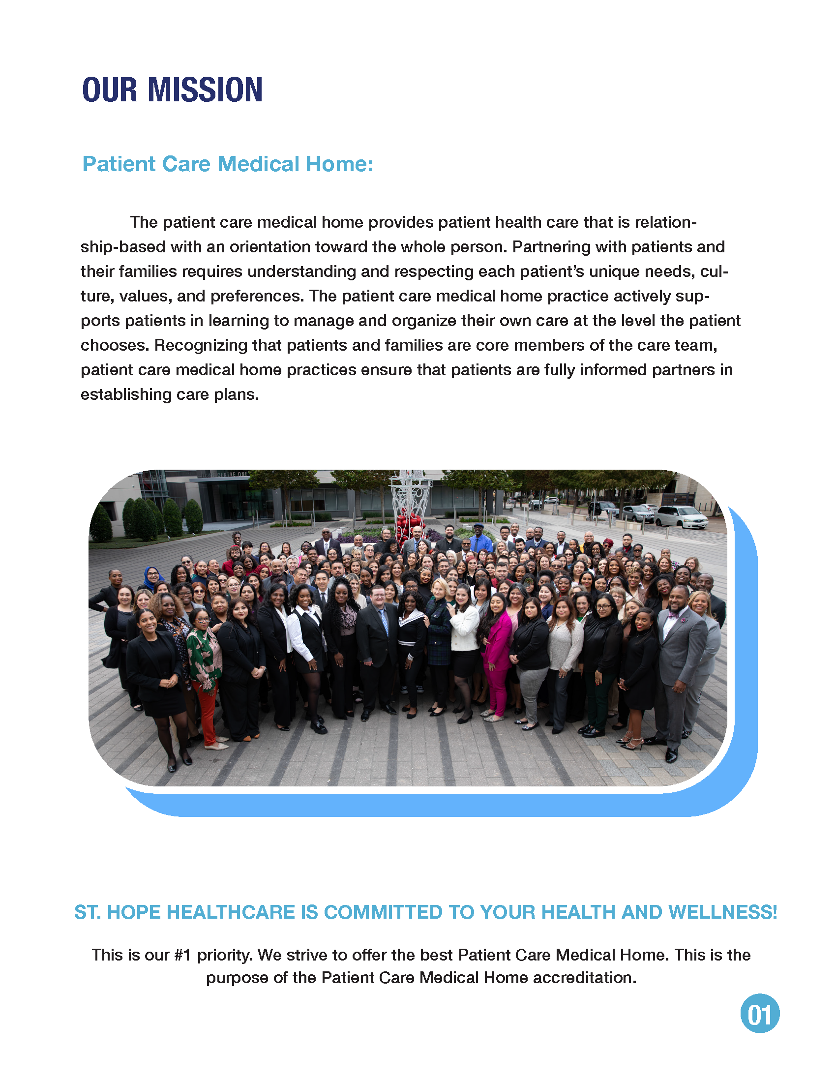 A large group of professional staff posing together in front of a building for a company mission statement photo.