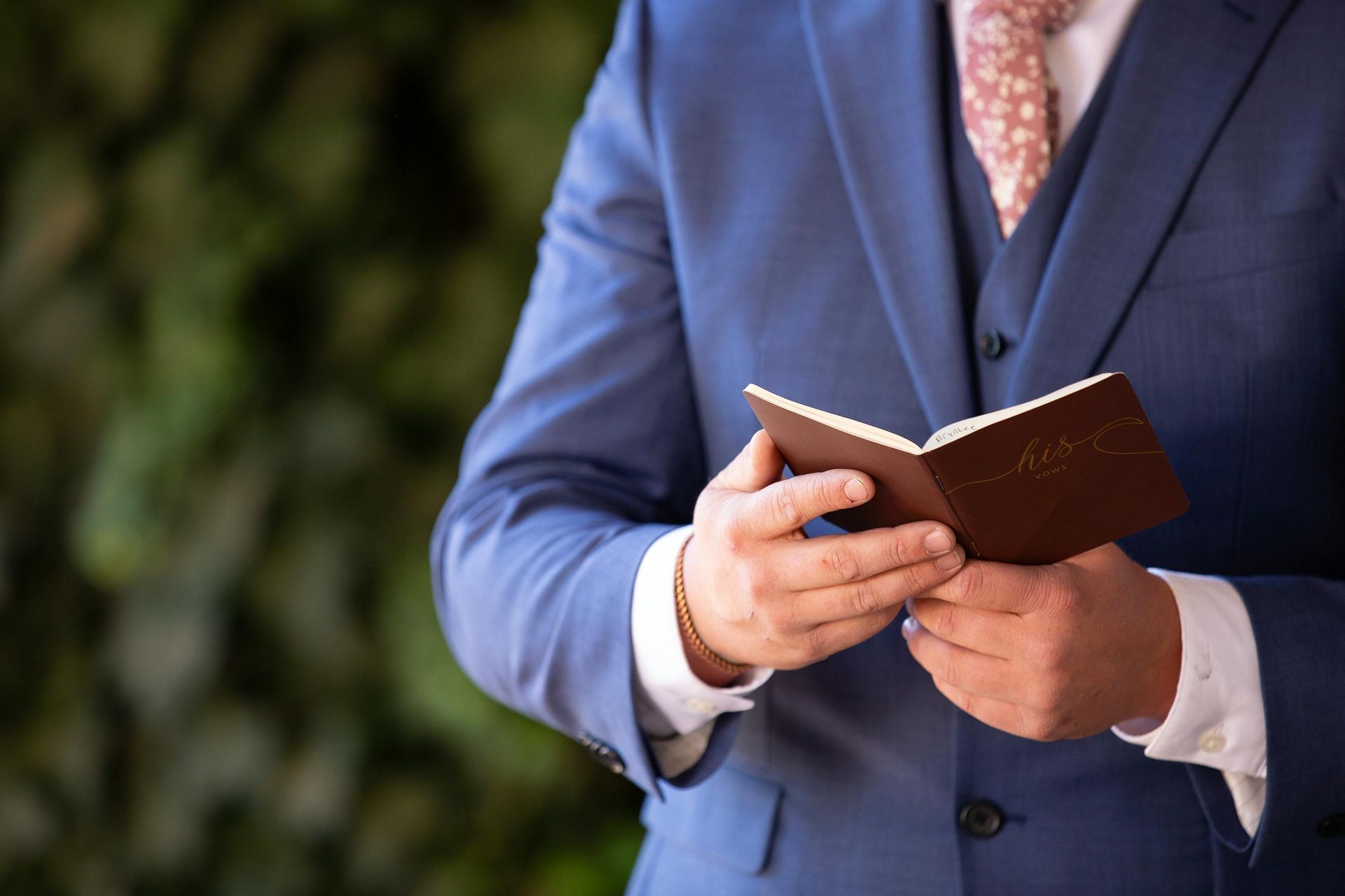 close-up of a person holding a custom booklet close-up of a person holding a custom booklet