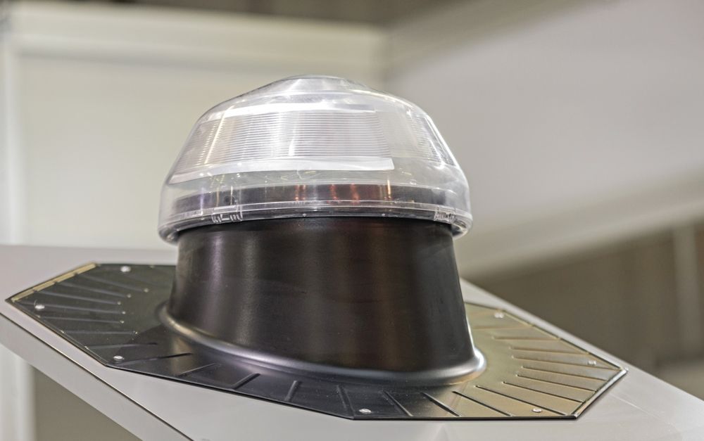 Solar tube daylighting dome designed to bring natural light into interior spaces