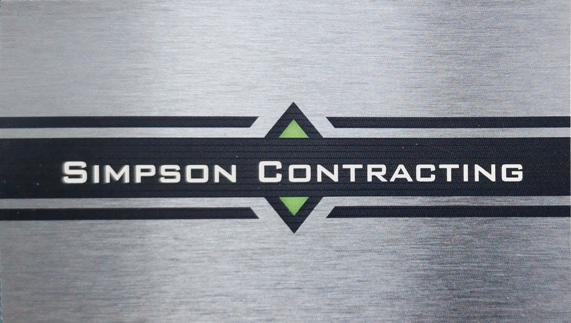 A business card for simpson contracting is shown