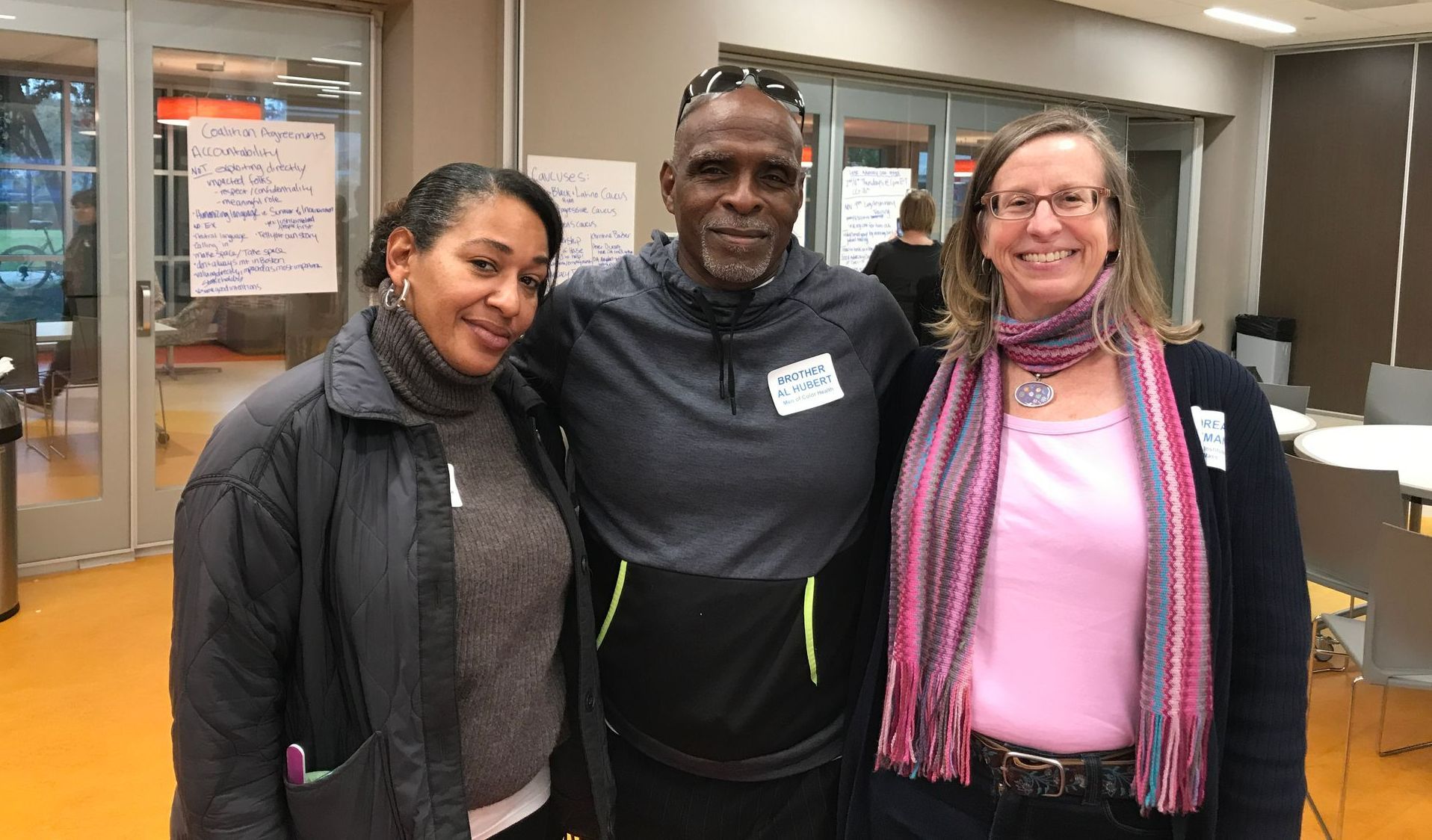 Jacqueline Velez, Brother Al Hubert, and Andrea Freeman smiling.