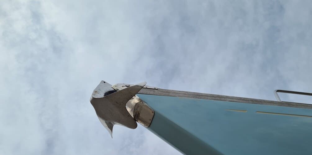 A close up of a bow with an anker