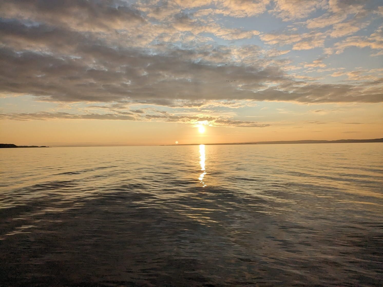 via boat ramp on the water for a sunset