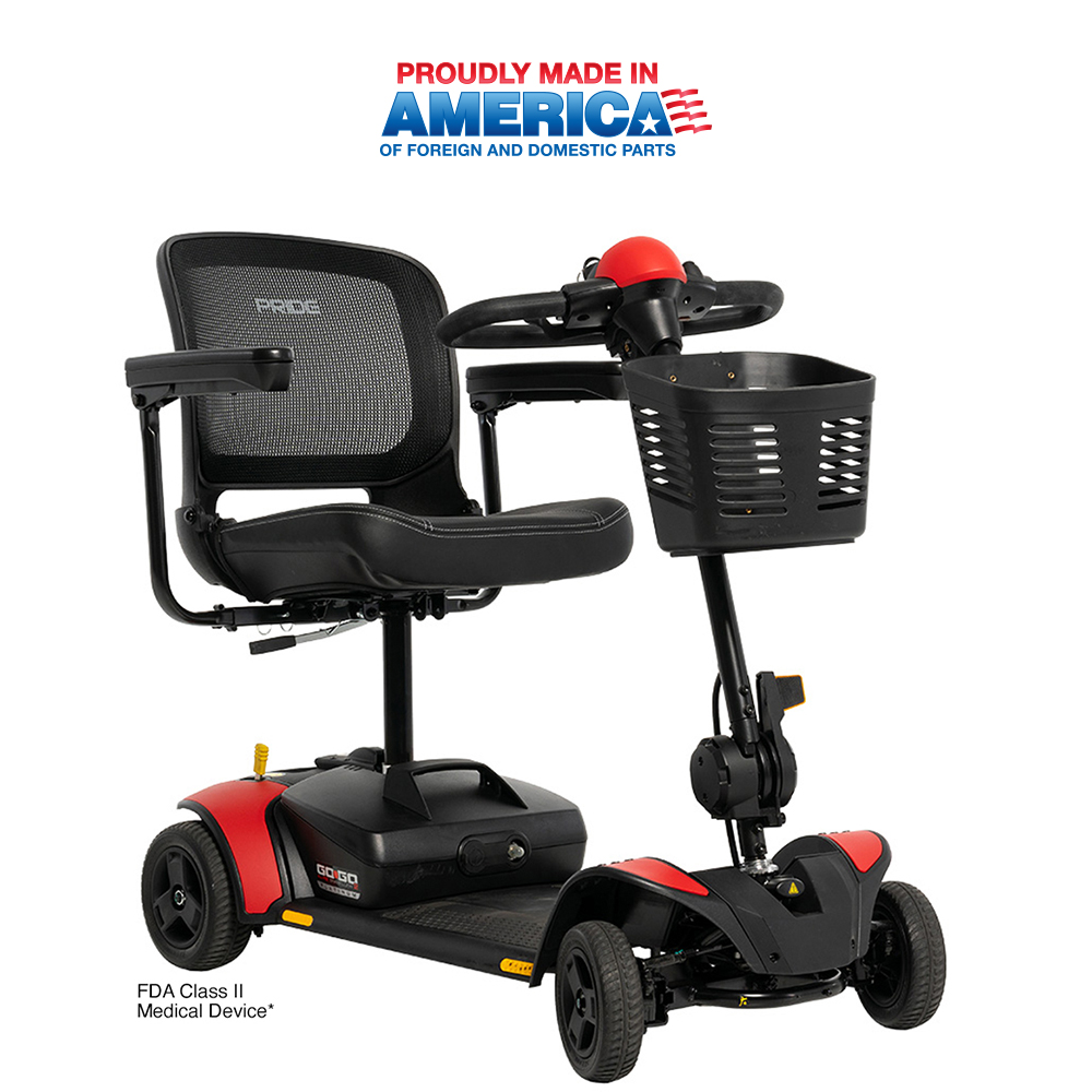 Mobility scooter, black and red, with basket and mesh seat.