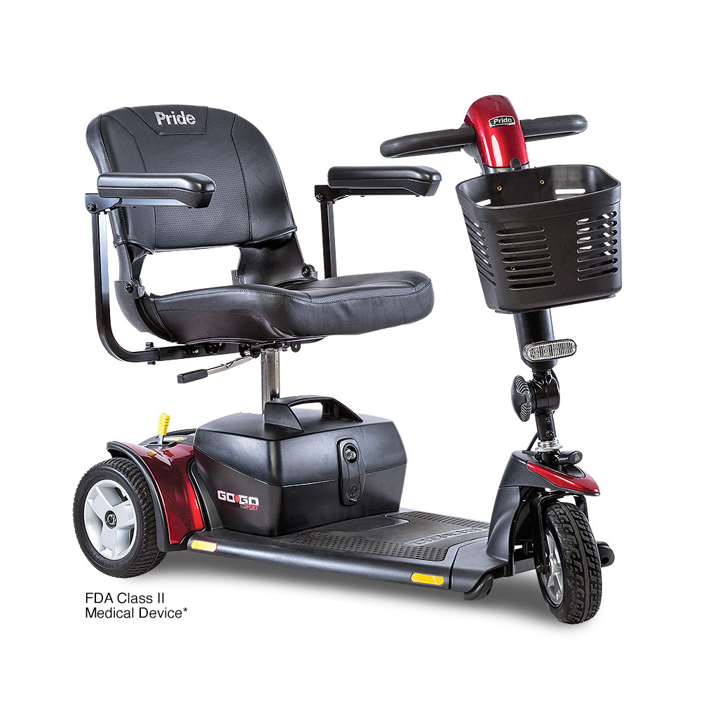 Red and black Pride Go-Go mobility scooter with a basket, seat, and three wheels.