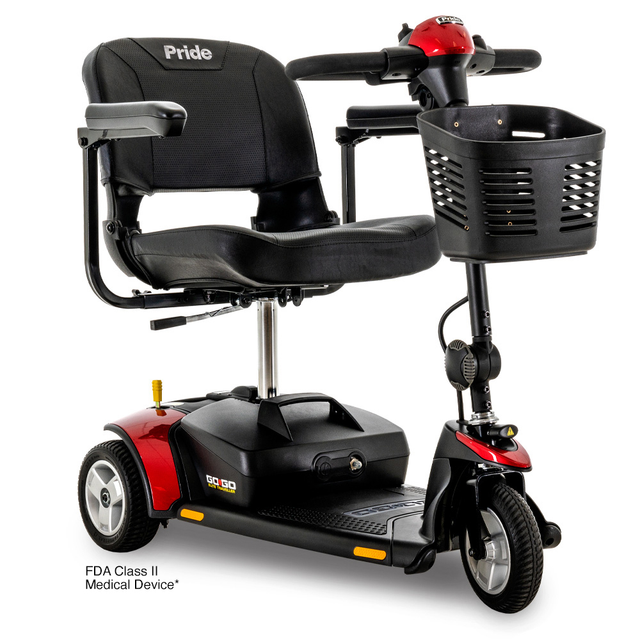 Red and black Pride Go-Go mobility scooter with basket, seat, and three wheels.