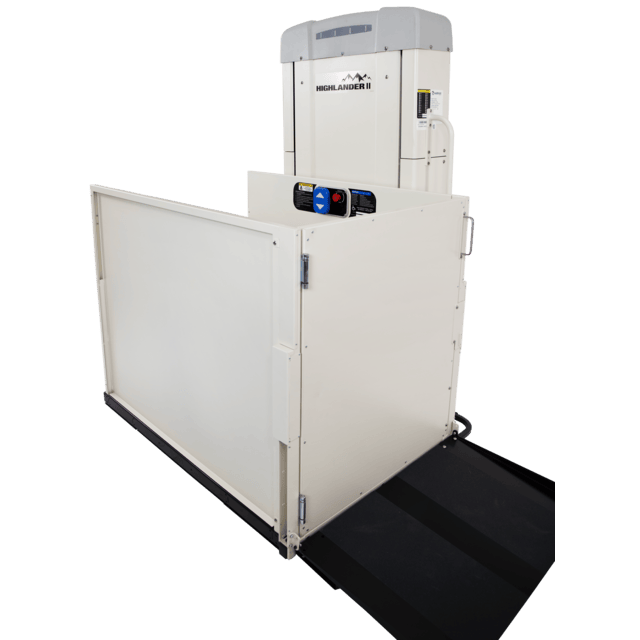 A beige wheelchair lift with a ramp, for providing access to a raised platform.