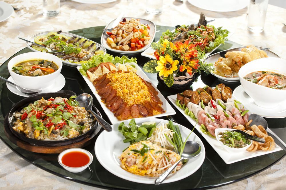 A Round Table Laden With Various Thai Dishes — Chefs2Go in Airlie Beach, QLD