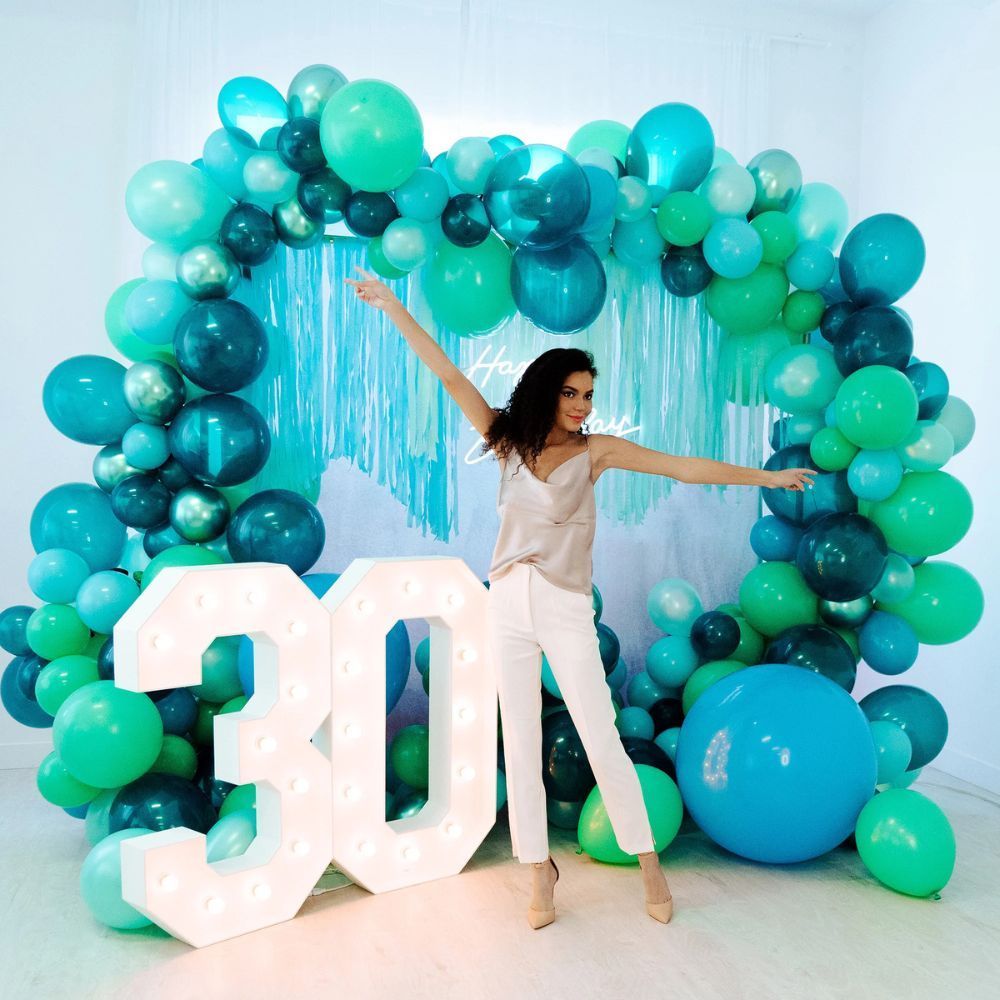 Guest celebrating a 30th birthday at an Alein photo booth in Denver