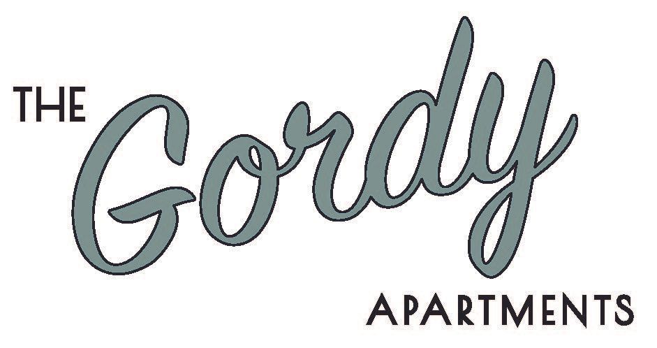 The Gordy Apartments logo in gray script on a white background