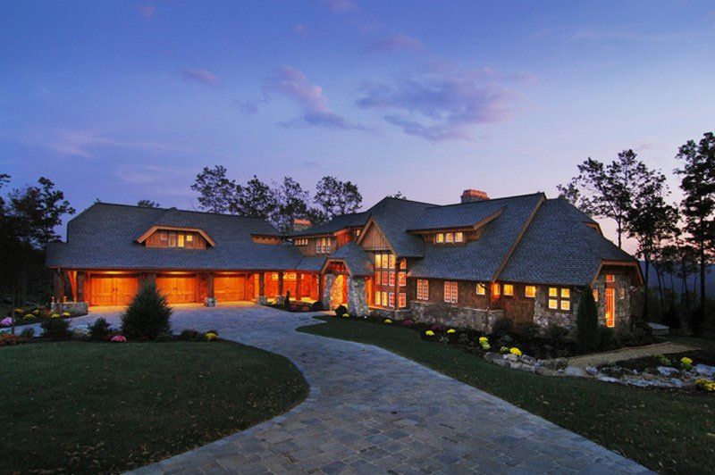 Large Home Front Exterior at Night | Wishon & Carter Builders