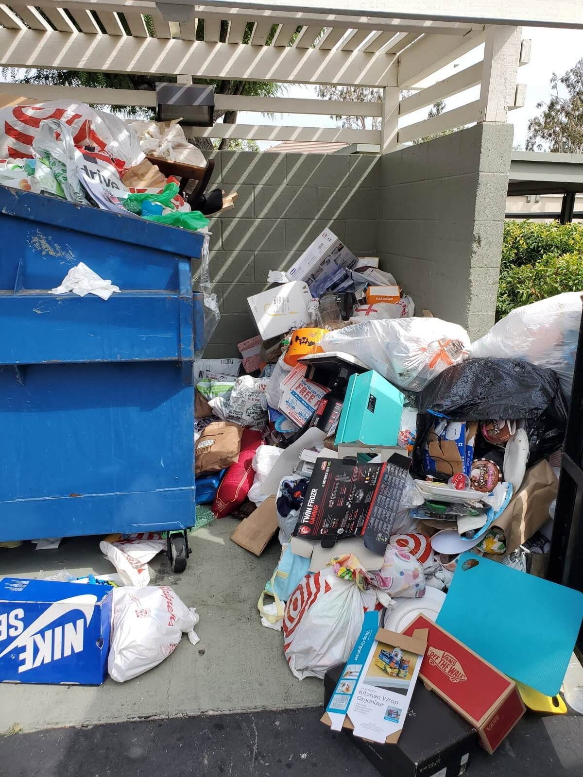 Overflowing trash bin during springtime in Upland, CA - Upland Junk Removal