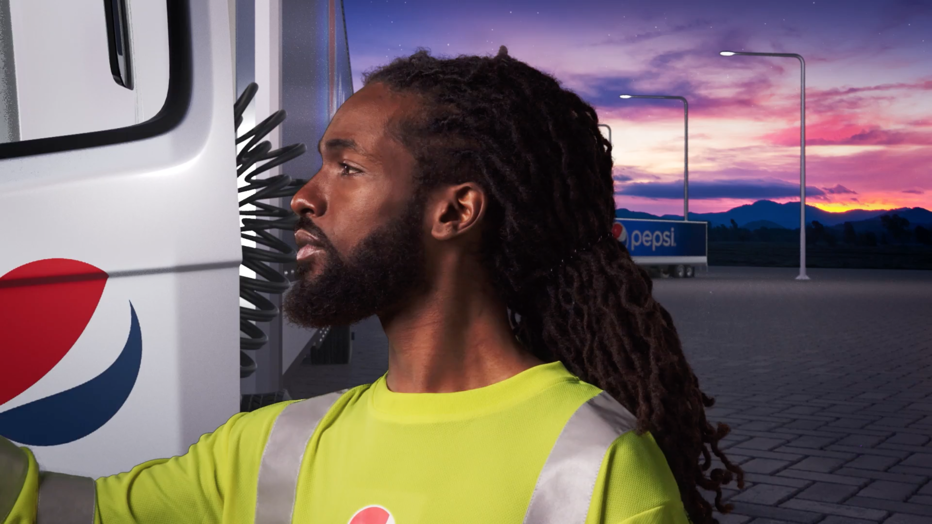 A man with dreadlocks is leaning against a pepsi truck.