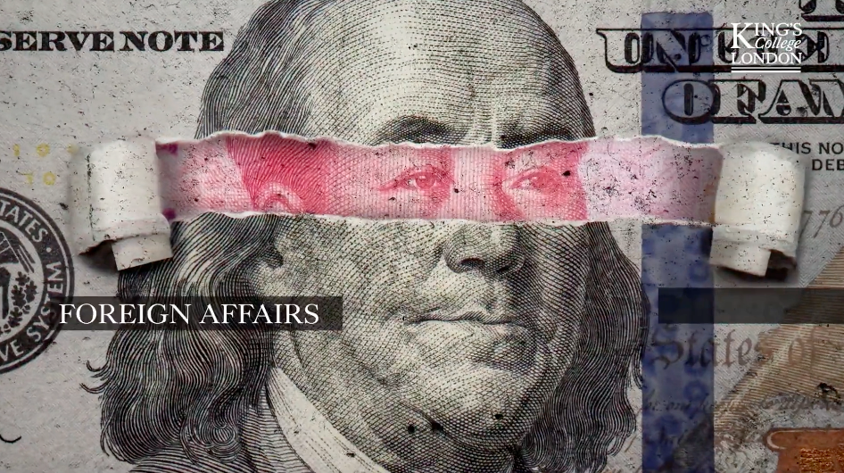 A close up of a dollar bill with foreign affairs written on it