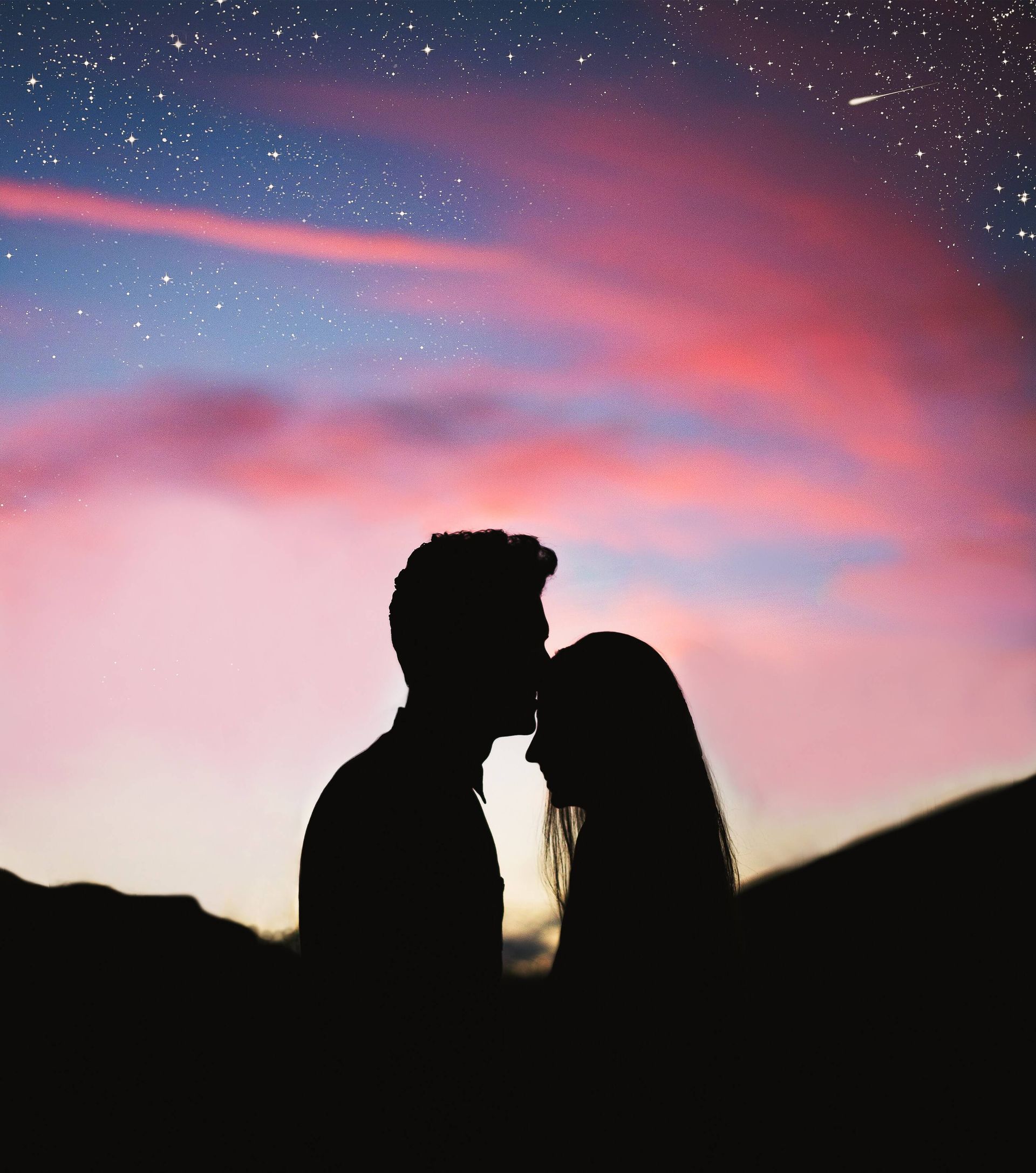 A couple hugs beneath a beautiful starry sky after reconnecting at a Couples Retreat in Orlando, FL. Hold Me Tight® Couples Retreats are available to couples throughout the United States.