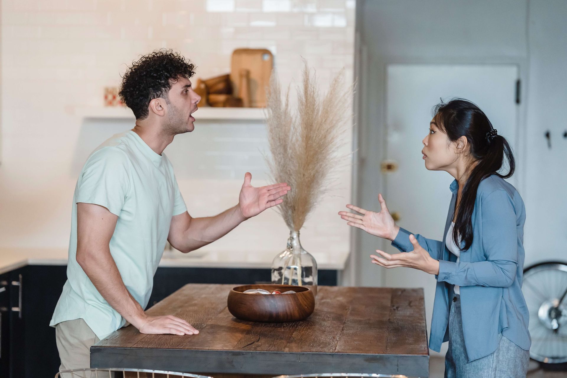 A couple argues as they struggle to communicate effectively. In couples therapy and still having issues? Boost your marriage therapy with a Couples Retreat in Florida, Georgia, South Carolina, and Beyond.