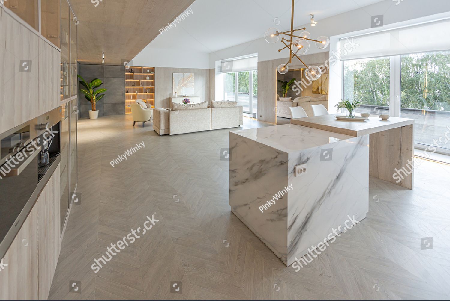 There is a large island in the middle of the kitchen.