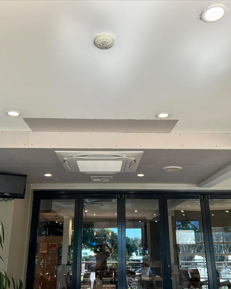 There is a Fire Alarm on the Ceiling of the Room — Gealy's Air-Conditioning, Refrigeration & Electrical in Noosaville, QLD