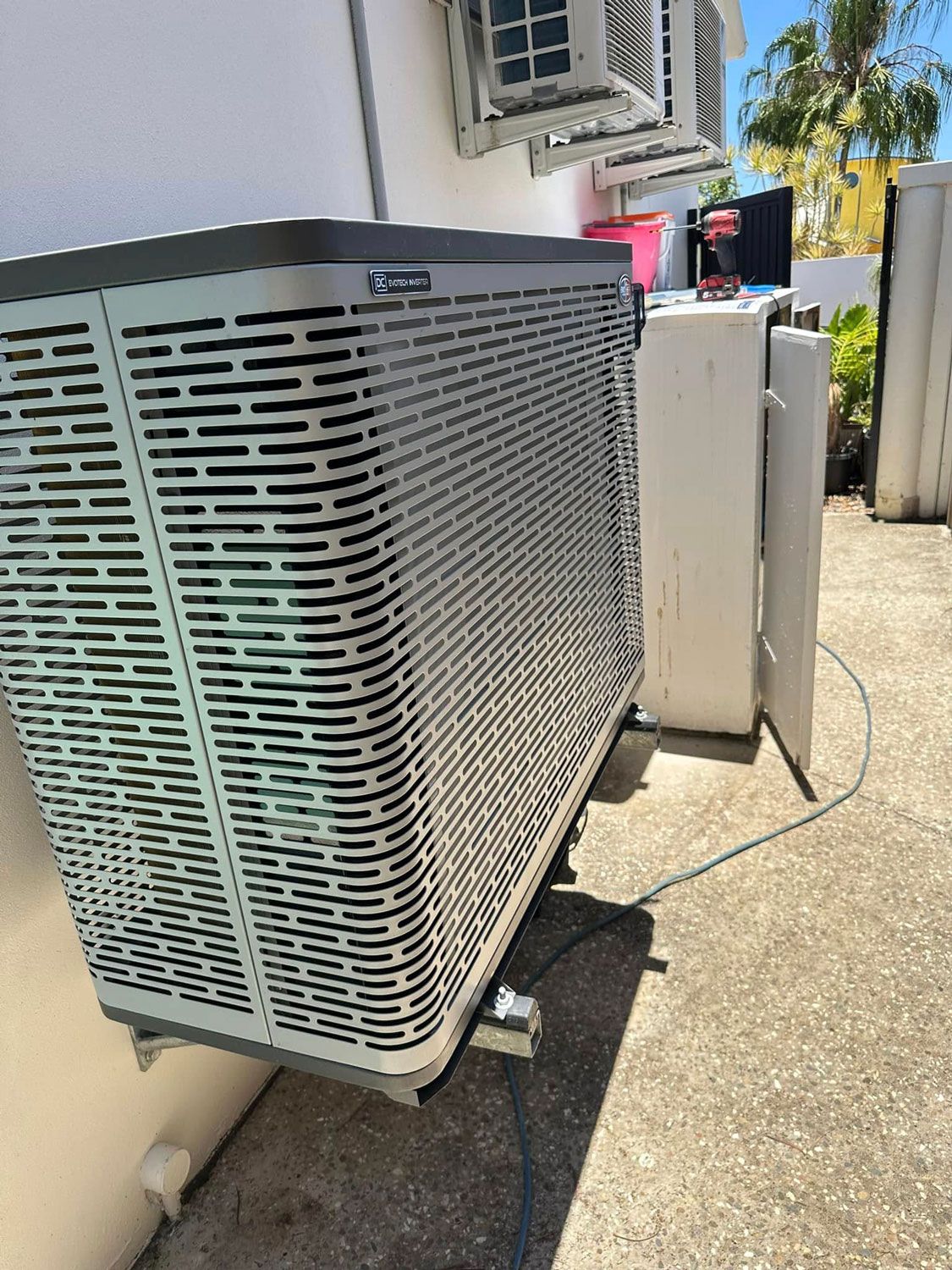 Pool Heat Pump Installed Mounted On The Wall