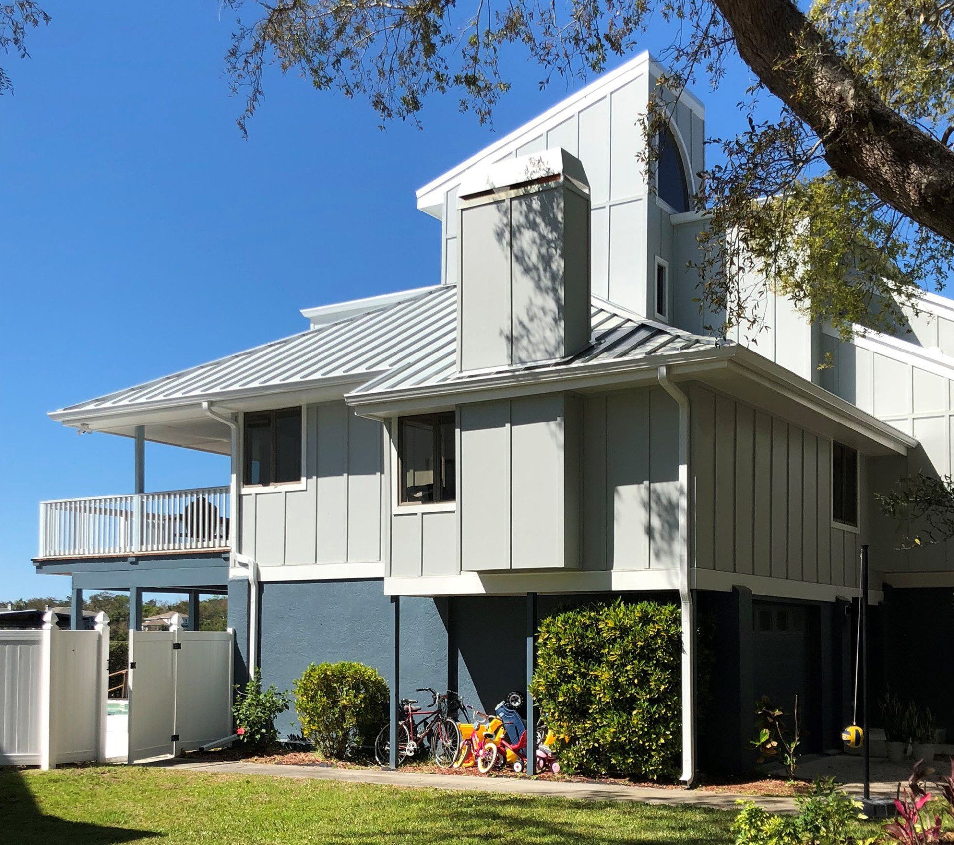 Linen Color Downspout — Palm Harbor, FL — Sure Fit Gutters