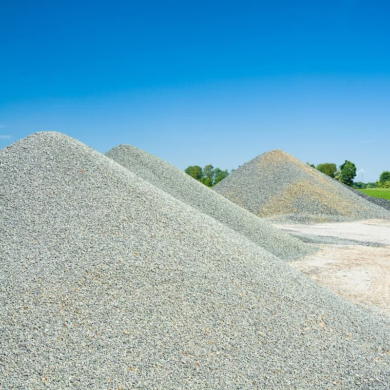 A Pile of Gravel is Stacked on Top of Each Other in a Field — A & B Mullins Excavations Pty Ltd in Bundaberg, QLD