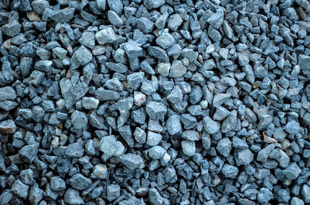 A Pile of Blue Gravel is Sitting on the Ground — A & B Mullins Excavations Pty Ltd in Bungadoo, QLD