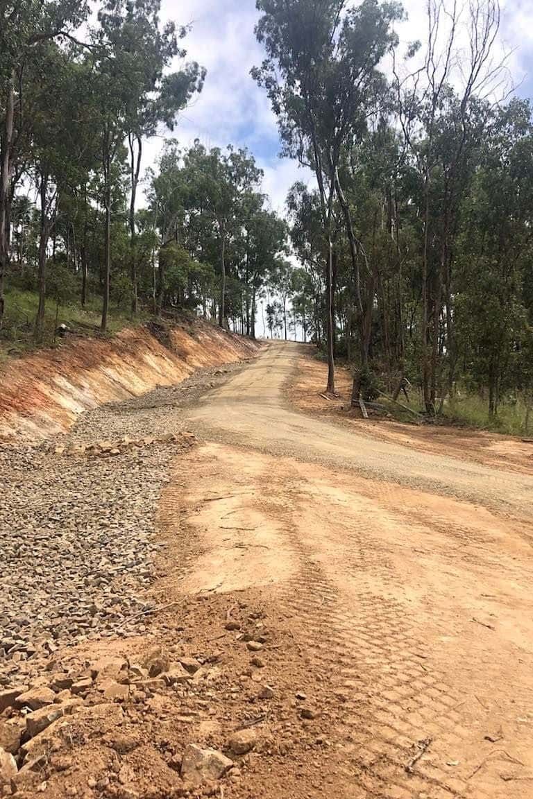 A Dirt Road Going Through a Forest With Trees on Both Sides —  A & B Mullins Excavations Pty Ltd in Bungadoo, QLD