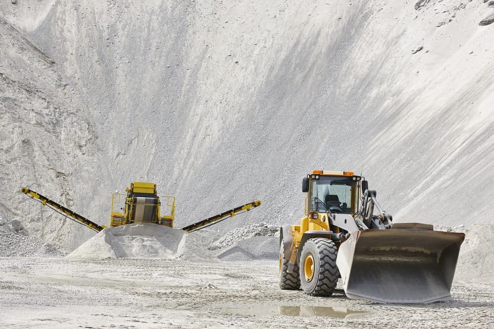 Two Bulldozers Are Moving Dirt in a Quarry — A & B Mullins Excavations Pty Ltd in Bungadoo, QLD