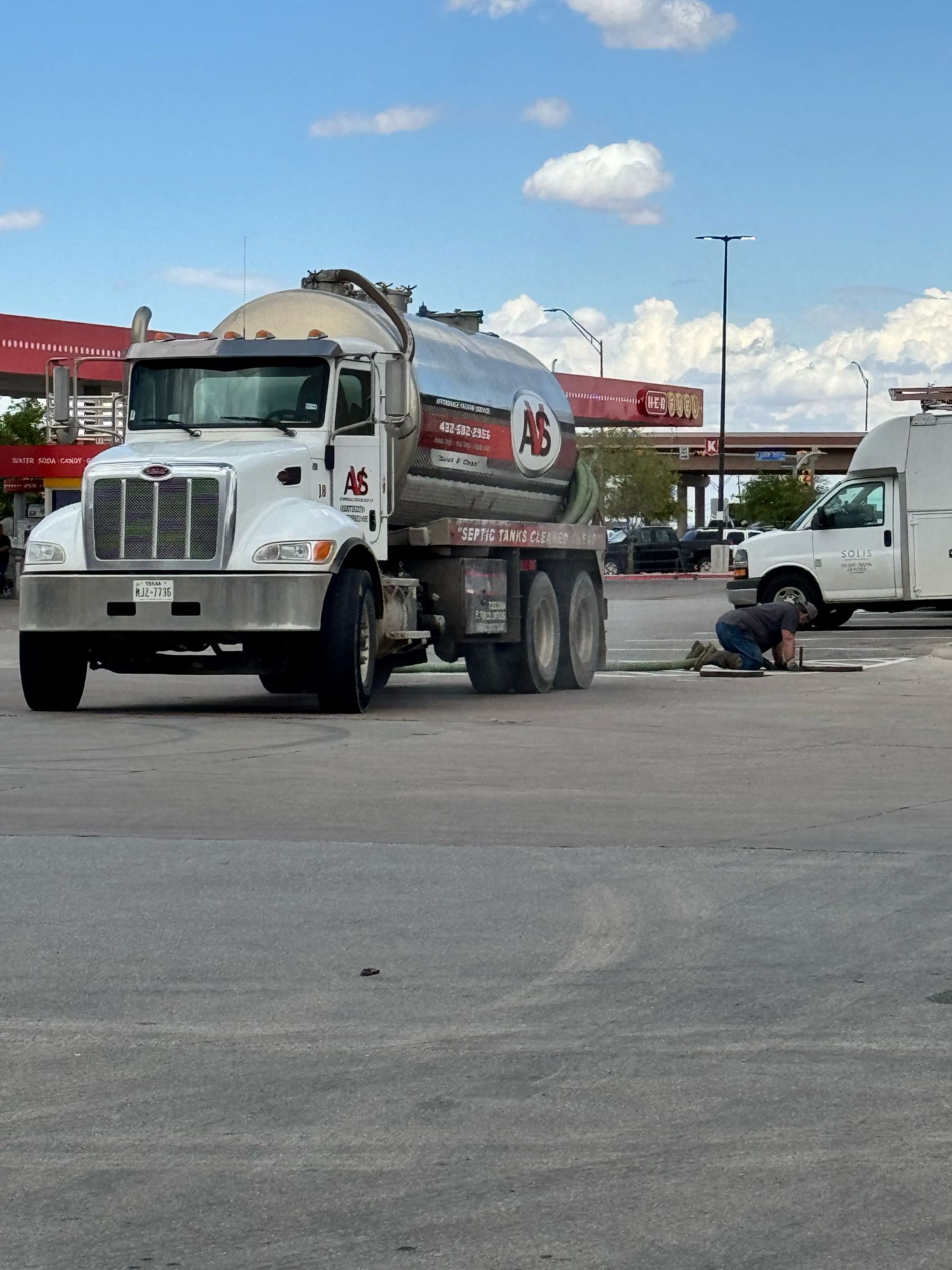 White truck with septic tank in Midland, TX