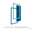 Logo con cornici di finestre blu sovrapposte e la scritta “GARONE SERRAMENTI”