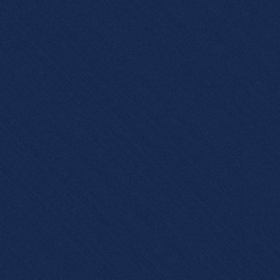 Gray and black speckled textured surface with scattered irregular fragments