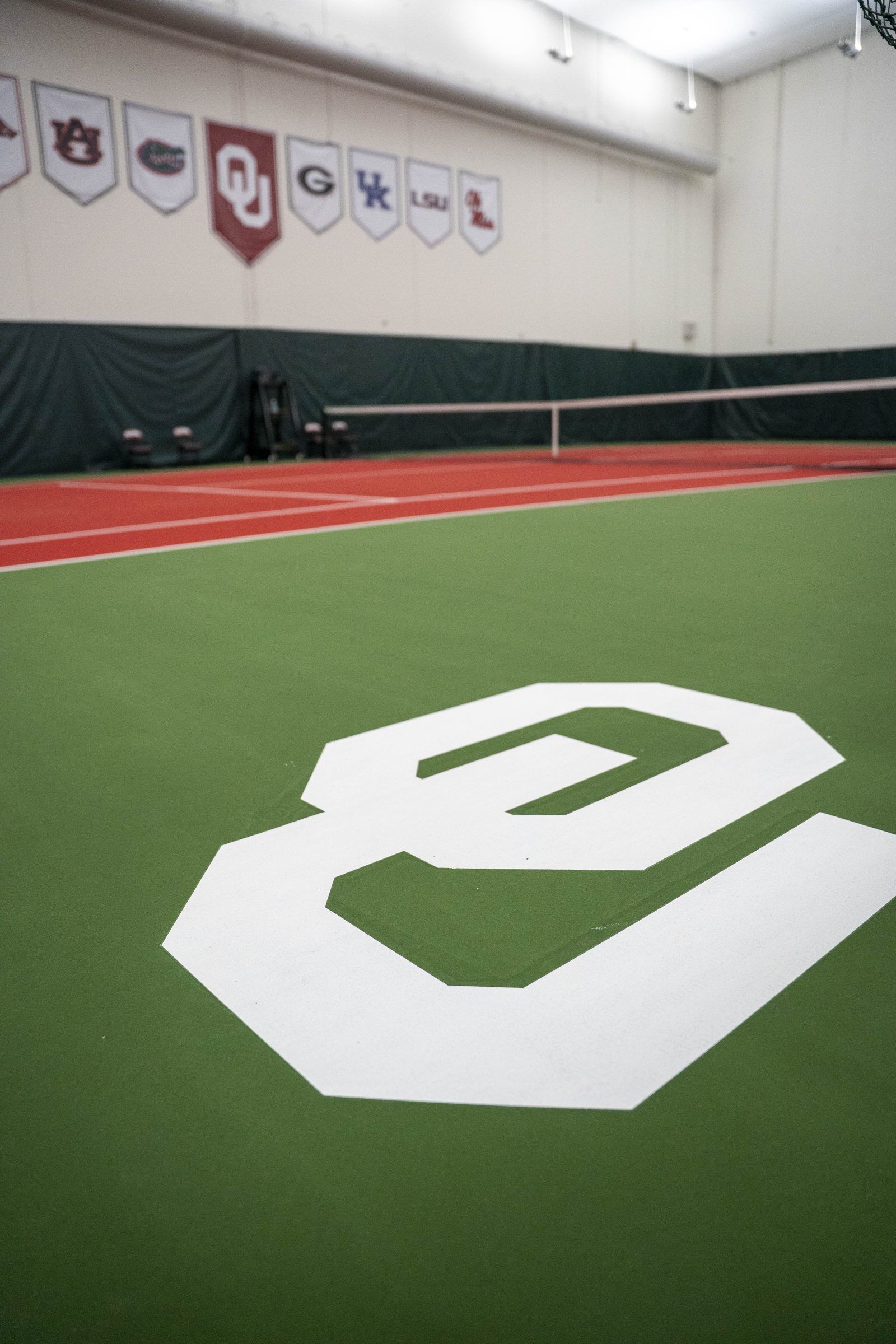 OU logo court painting on indoor tennis court