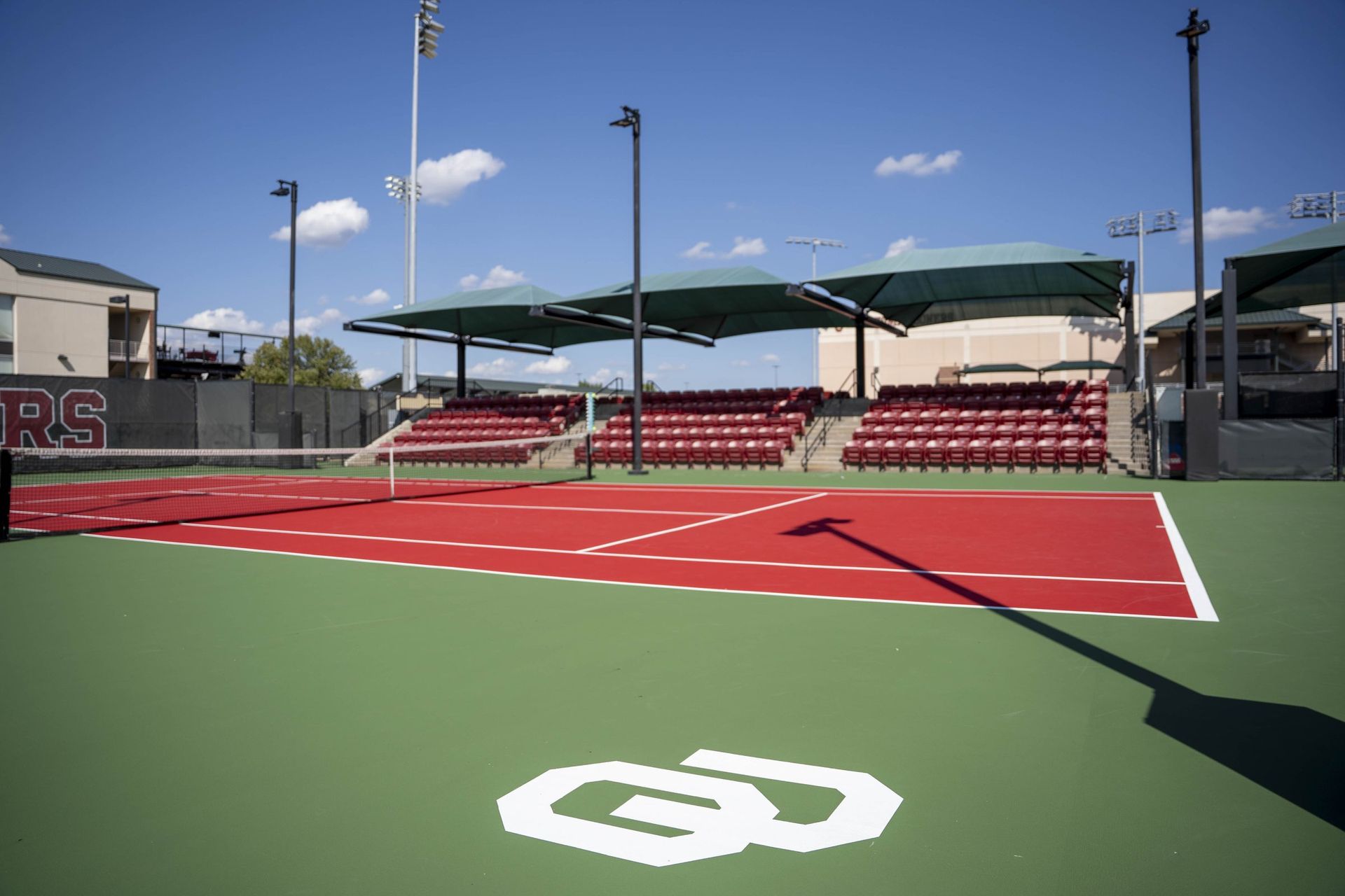 OU logo on resurfaced outdoor tennis court