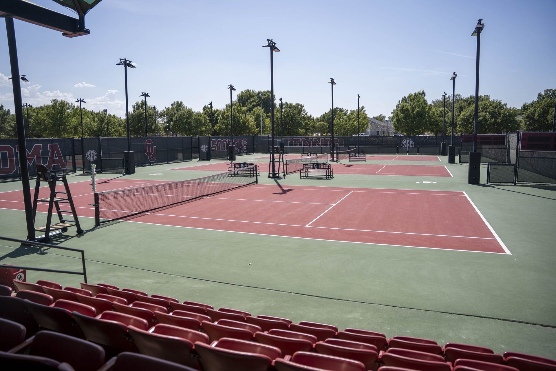 Resurfaced outdoor tennis courts with stadium seating
