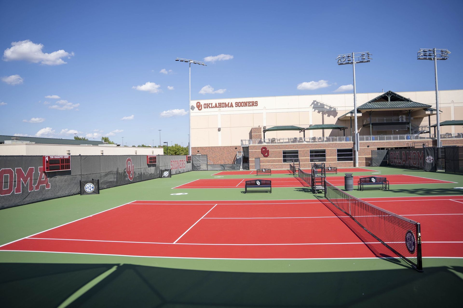 Outdoor collegiate tennis courts with Laykold surface