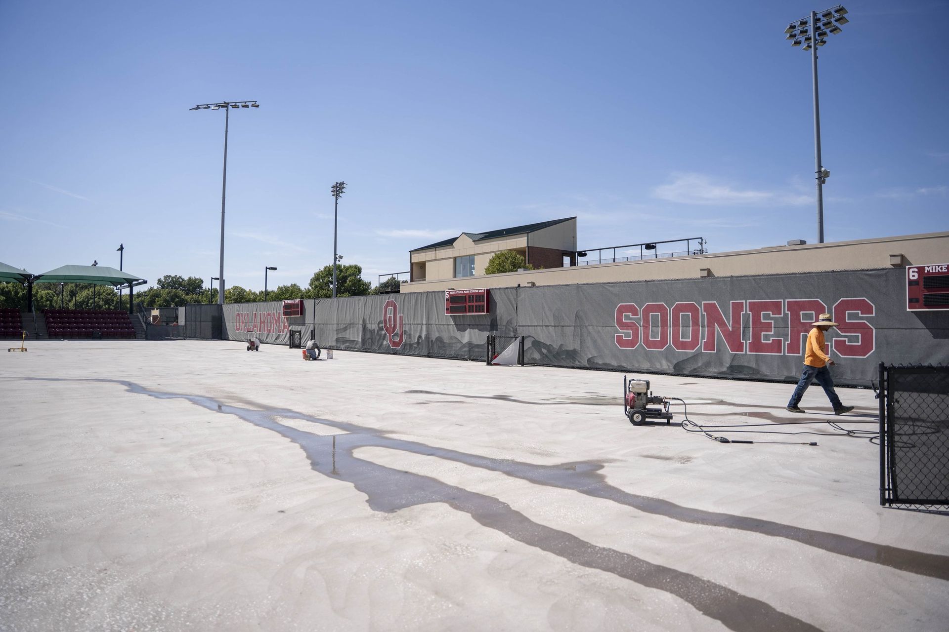 Tennis court crack repair surface prep at OU