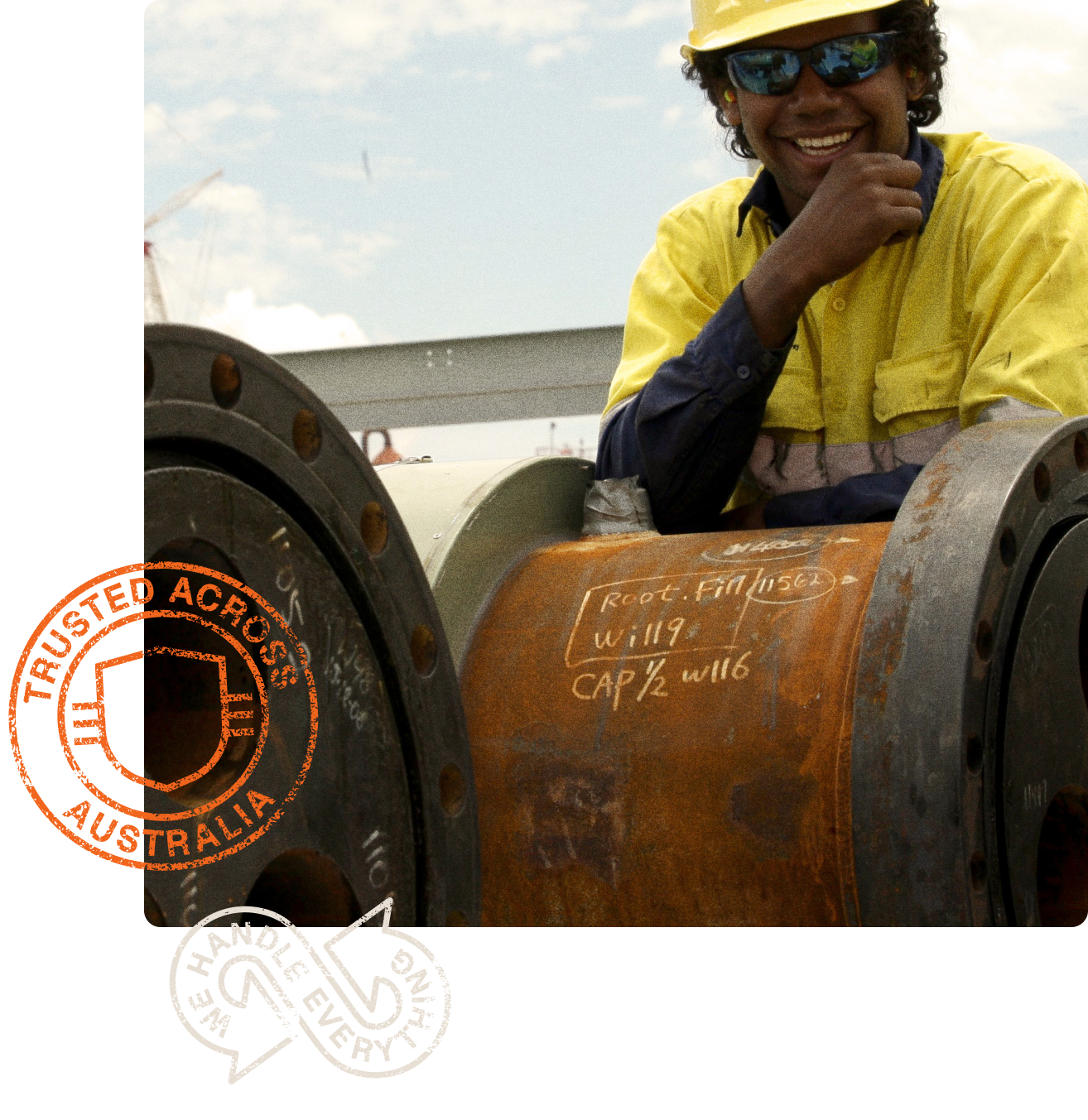 A man wearing a yellow hard hat sits next to a rusty pipe with a stamp that says trusted across australia