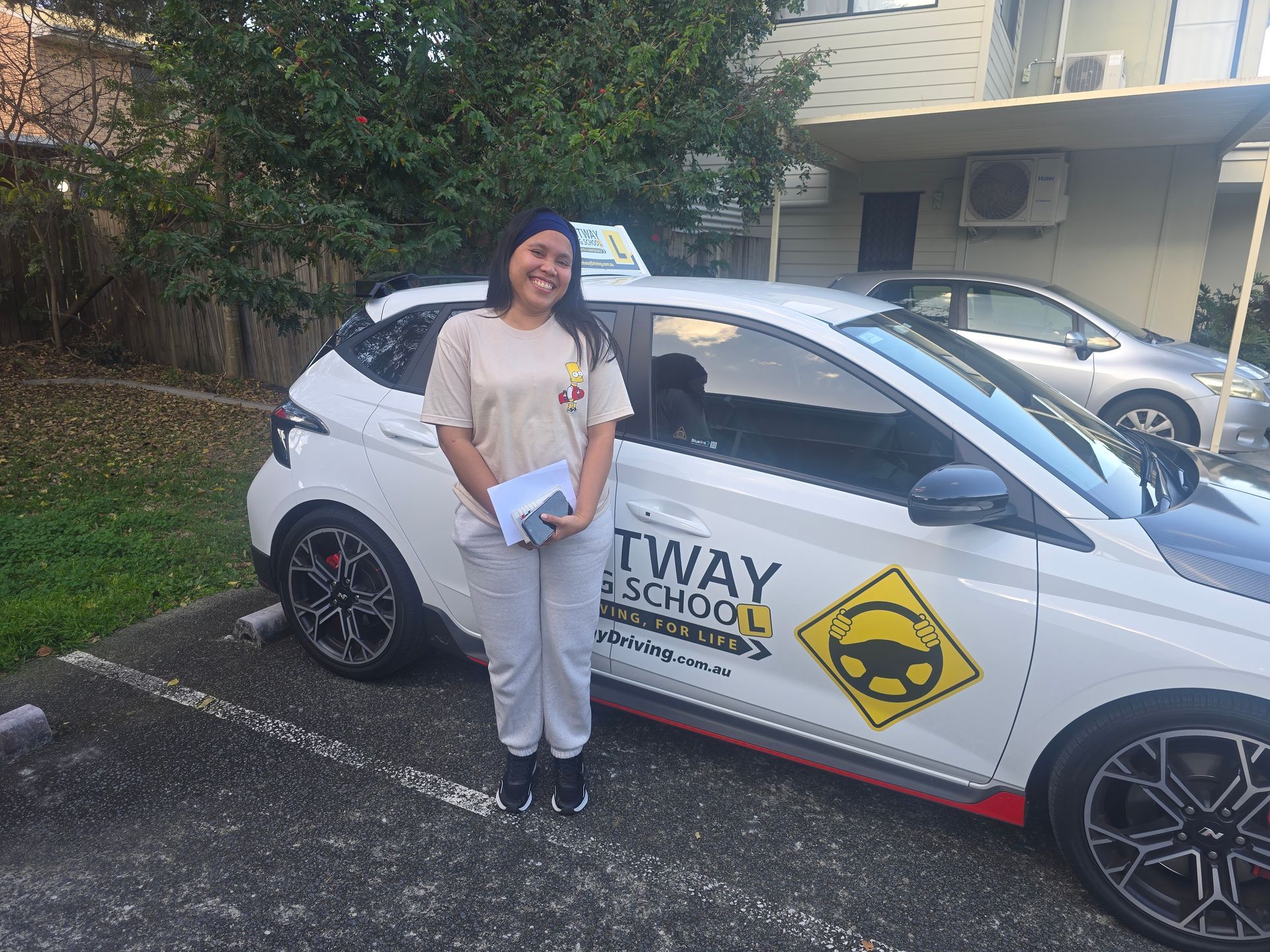 Noveliana at her driving lesson