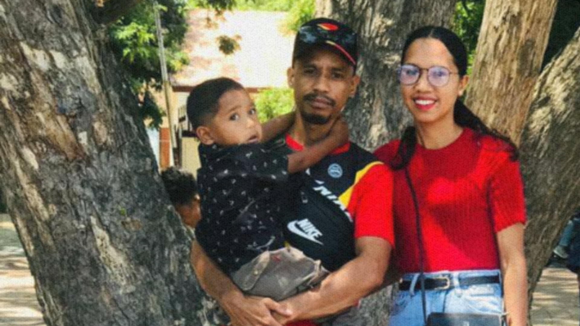 8,000th PALM worker, Christiano, celebrating with his family under a large tree. A proud milestone for RWM, the PALM scheme and the opportunities it provides.
