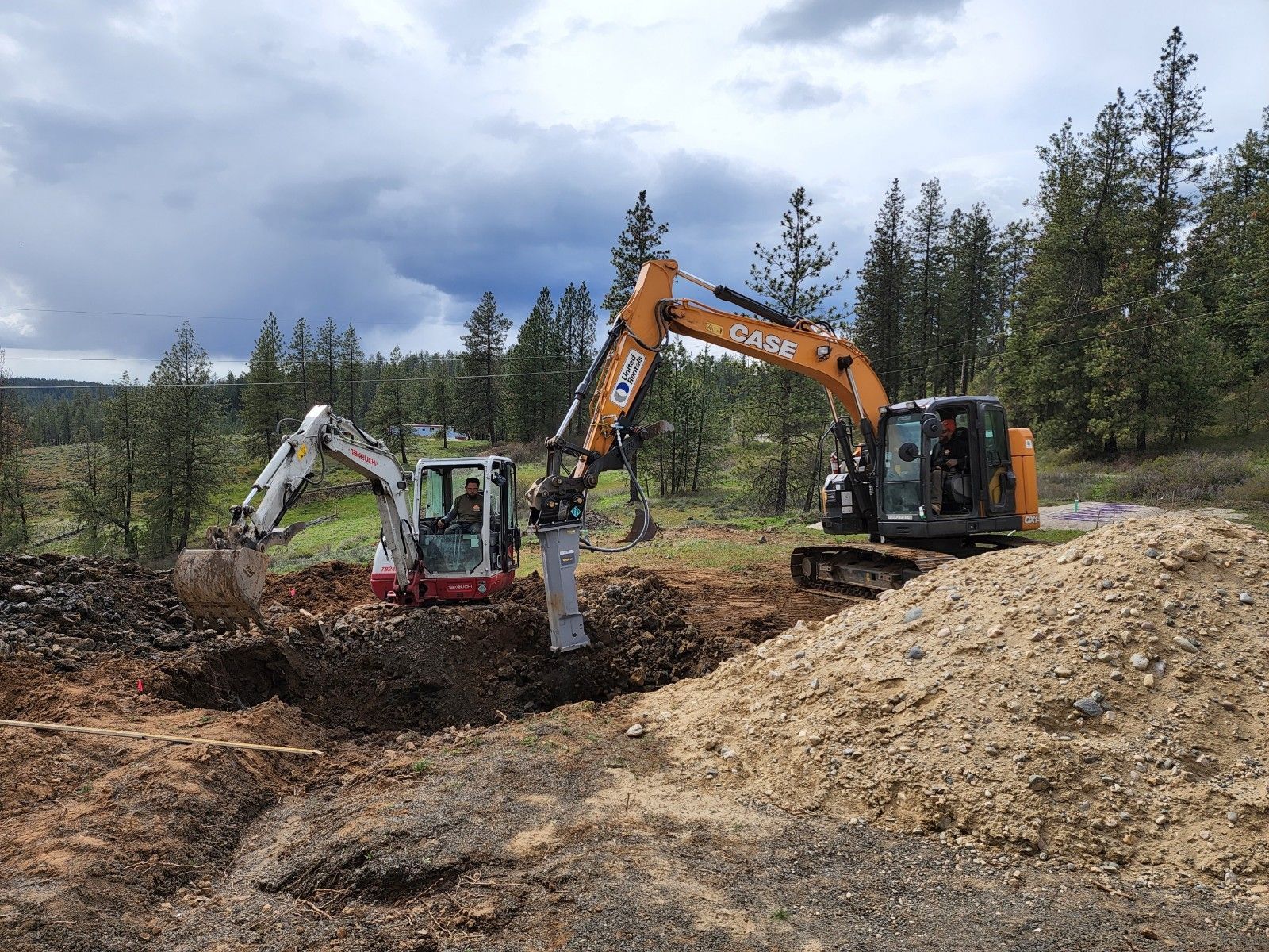 Big Excavator — Spokane Valley, WA — Junk Grunts LLC Big Excavator — Spokane Valley, WA — Junk Grunts LLC