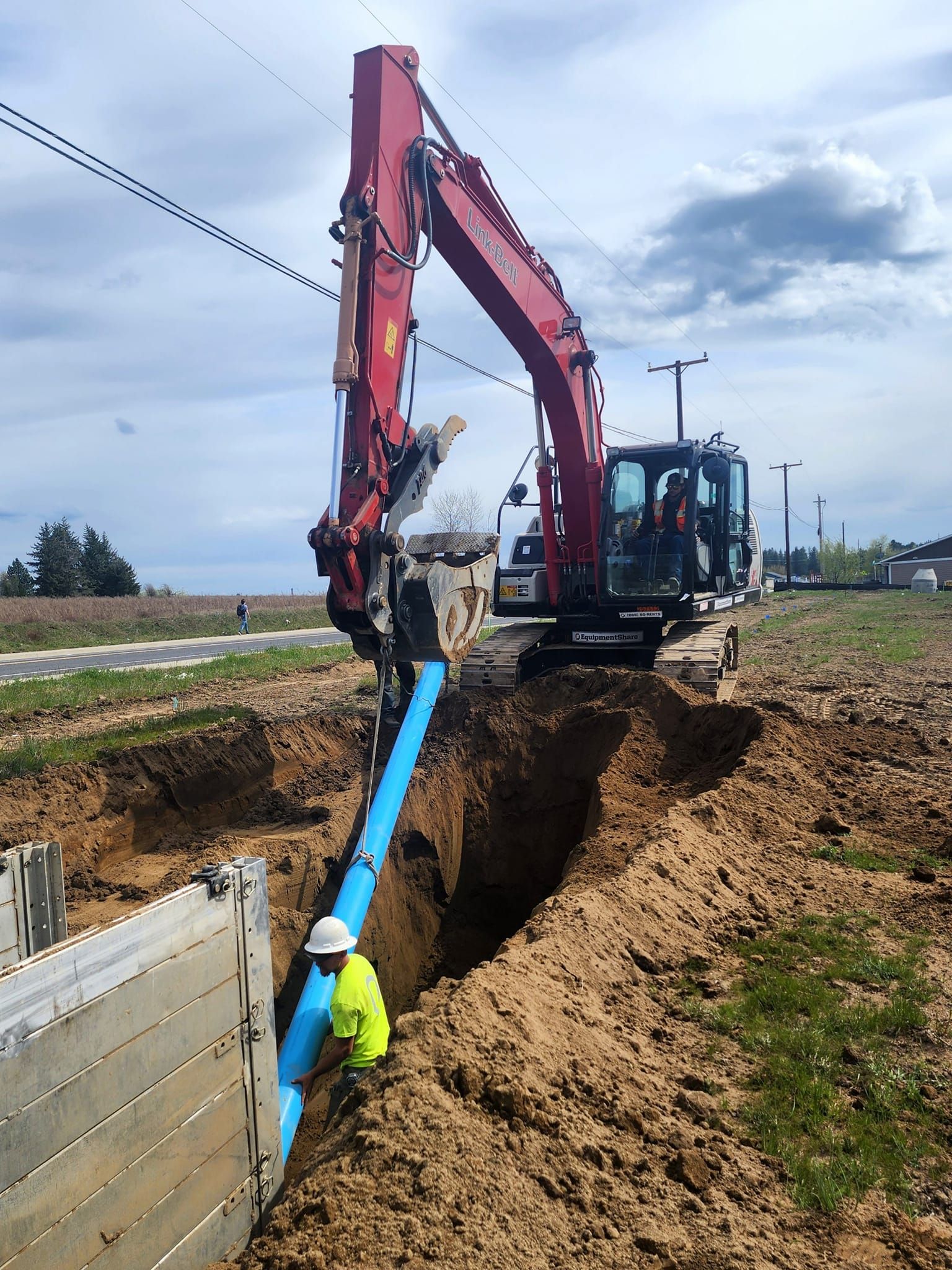 Worker Holding Tablet — Spokane Valley, WA — Junk Grunts LLC Worker Holding Tablet — Spokane Valley, WA — Junk Grunts LLC