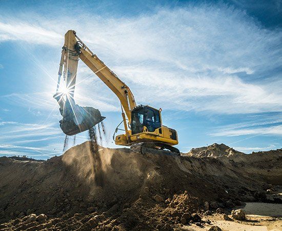 Big Excavator — Spokane Valley, WA — Junk Grunts LLC Big Excavator — Spokane Valley, WA — Junk Grunts LLC