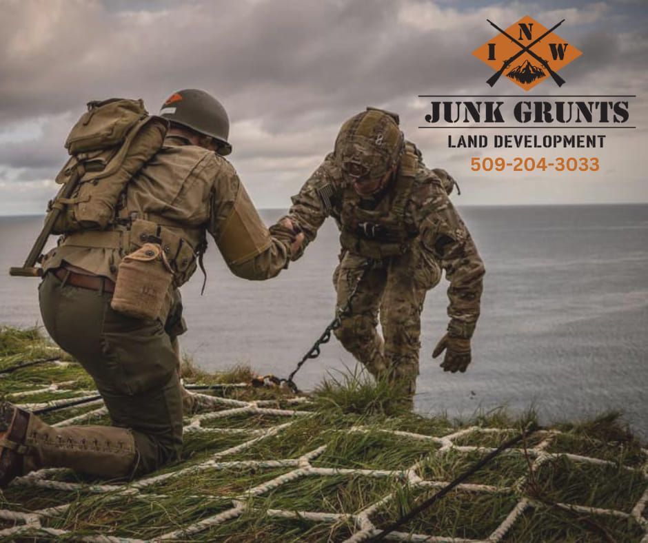 Worker Holding Tablet — Spokane Valley, WA — Junk Grunts LLC Worker Holding Tablet — Spokane Valley, WA — Junk Grunts LLC