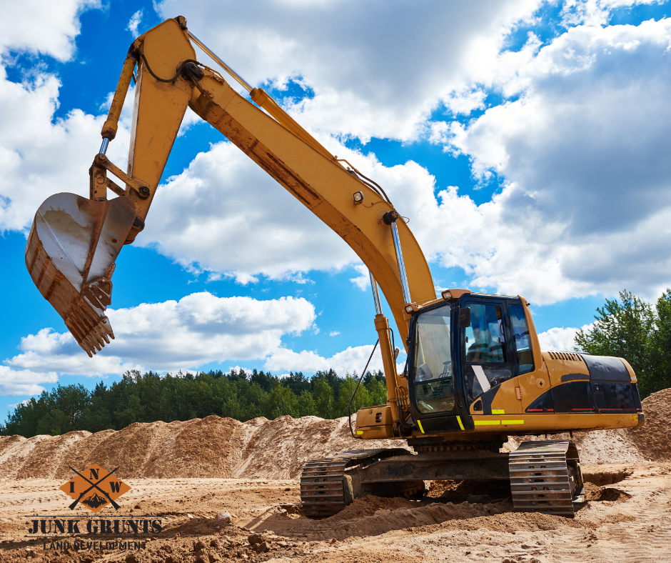 Worker Holding Tablet — Spokane Valley, WA — Junk Grunts LLC